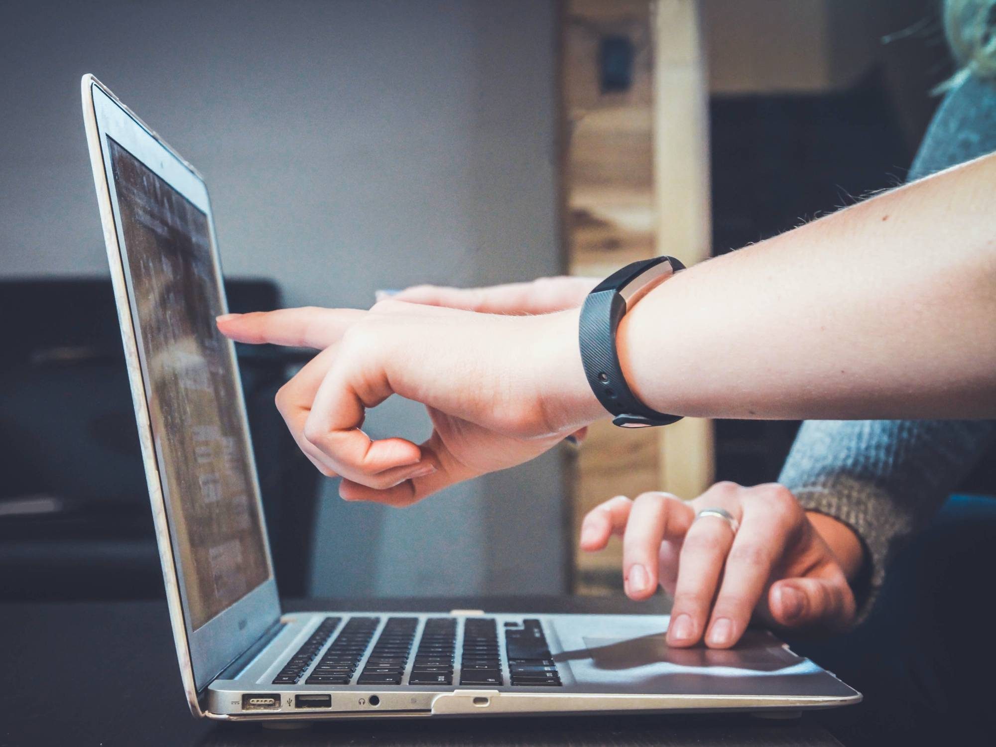 people-touching-laptop-screen-3040412